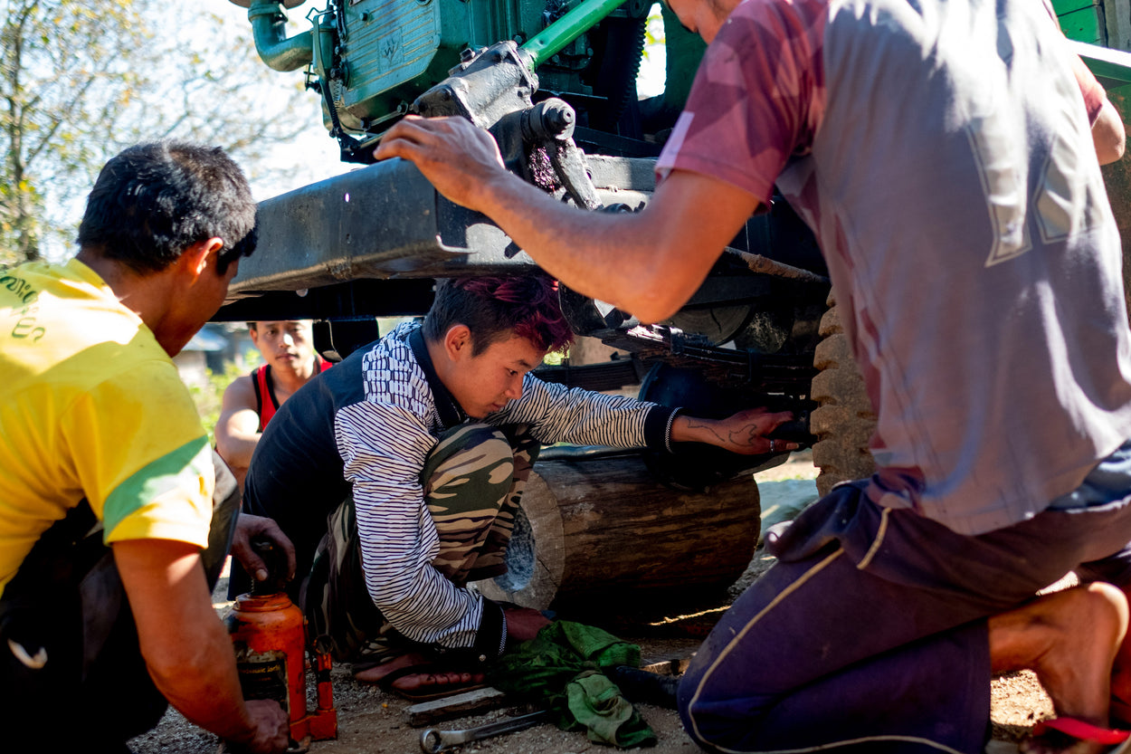 Teenage boys learn how repair machines to provide them an income.